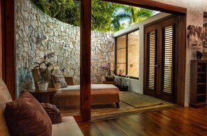 19 This outdoor shower is tucked into coral walls for privacy